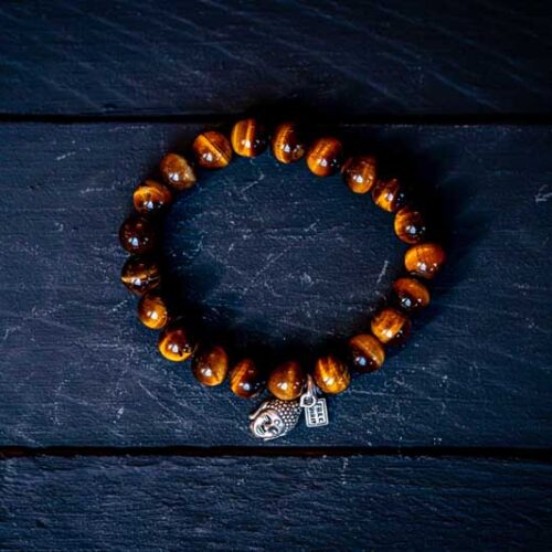 Kralen armband tiger eye met zilveren zen buddha hoofdje