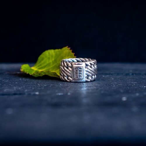 Zilveren dames en heren ring Dare large