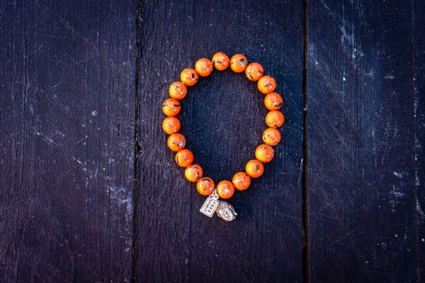 Beads armband Howliet orange met zen buddha hoofdje
