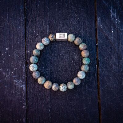 Kralen armband African turkoois mat met zilveren logoblokje