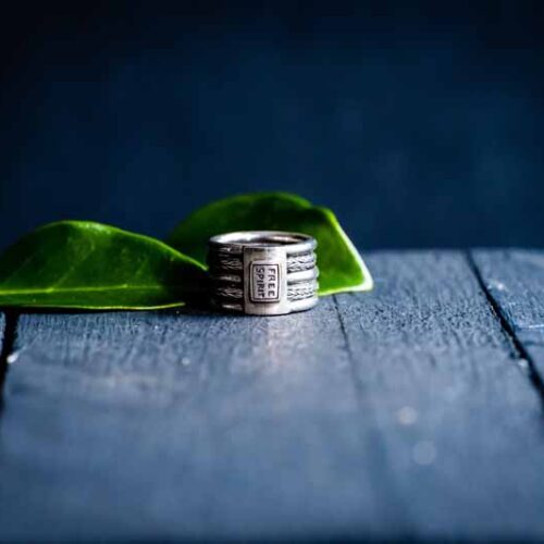 Zilveren dames en heren ring Mission