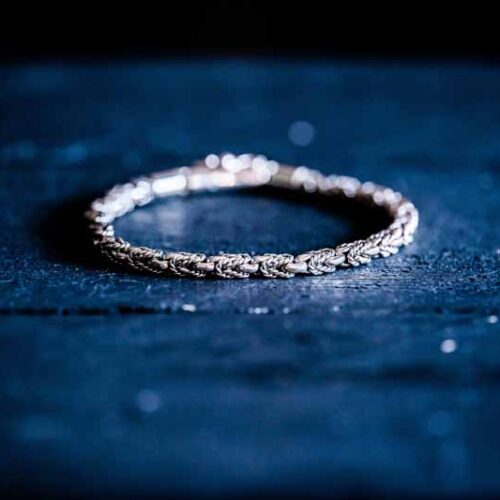 Zilveren dames en heren armband Suspicious