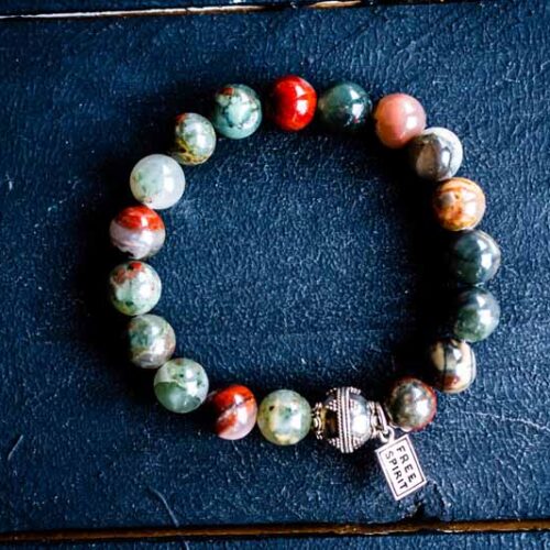 Kralen armband Indiase agaat met tibetaans geluk balletje