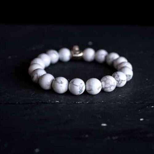 Kralen armband witte howliet met zilveren happy buddha