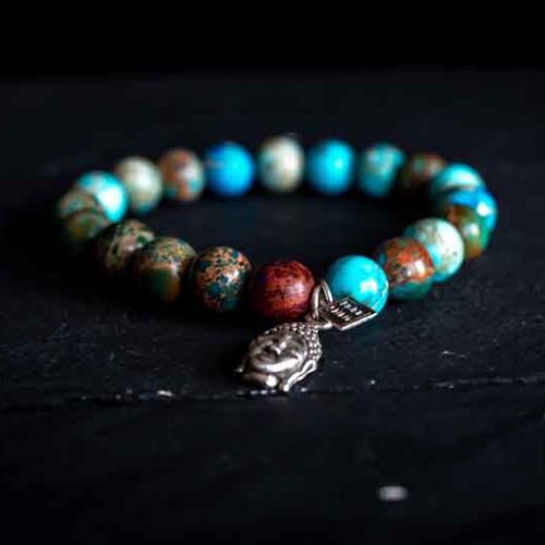 Kralen armband zee sediment licht turkoois met zen buhhha hoofdje