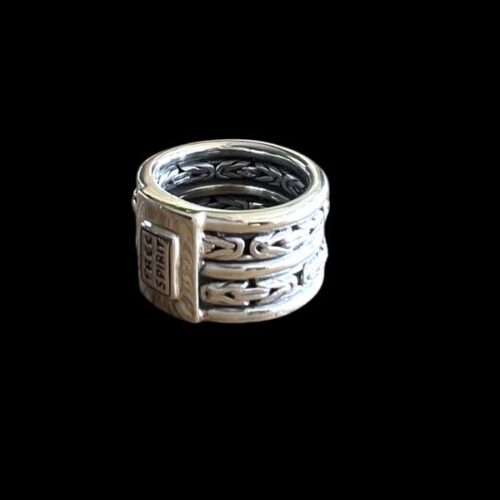 Zilveren dames en heren ring Rough