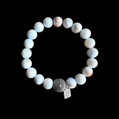 kralen armband lichtblauwe jade met zilveren balletje