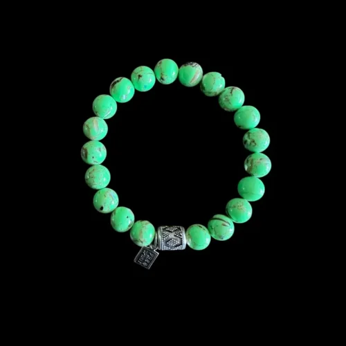 Kralen armband howliet appelgroen met tibetaanse bedel