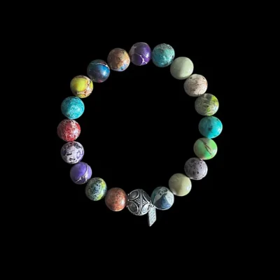 Kralen armband zeesediment mix 2 met zilveren geluksballetje