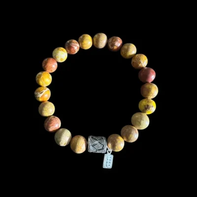 Kralenarmband zeesediment geel met zilveren koker