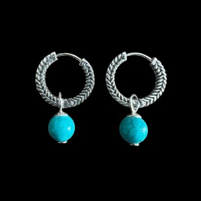 Zilveren oorbellen met turquoise kralen