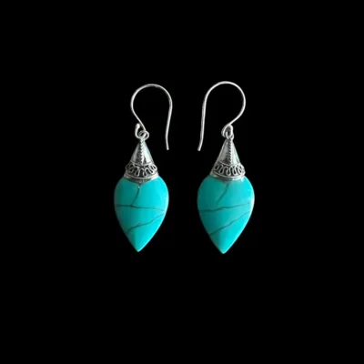 Oorbellen met blauwe steen