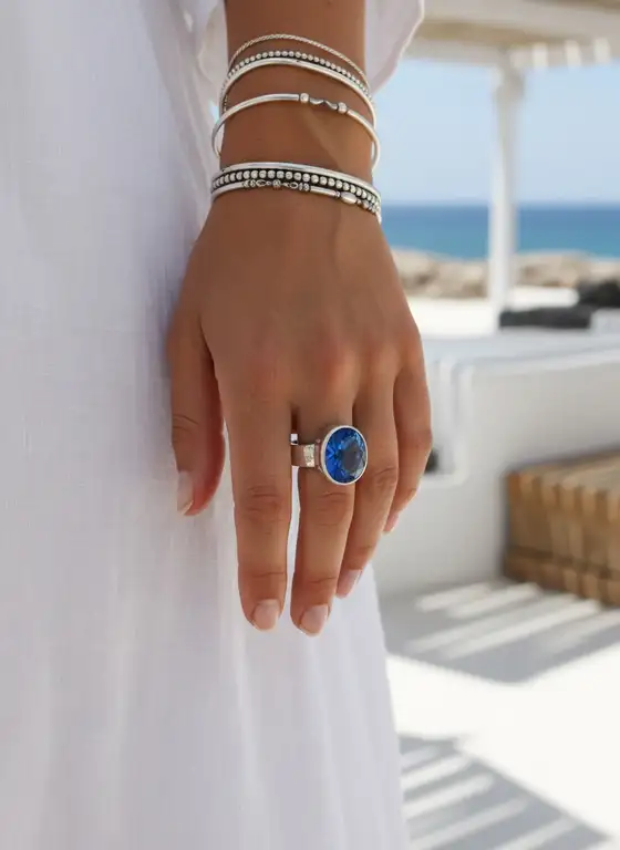 Zilveren dames en heren ring Ujung met blauwe obsidiaan 2 Zilveren ring met donkerblauwe steen