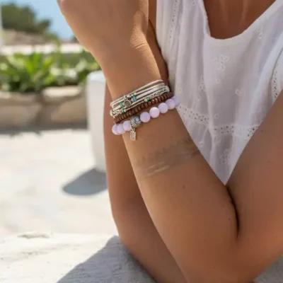 Kralen armband roze jade met tibitaans geluksballetje