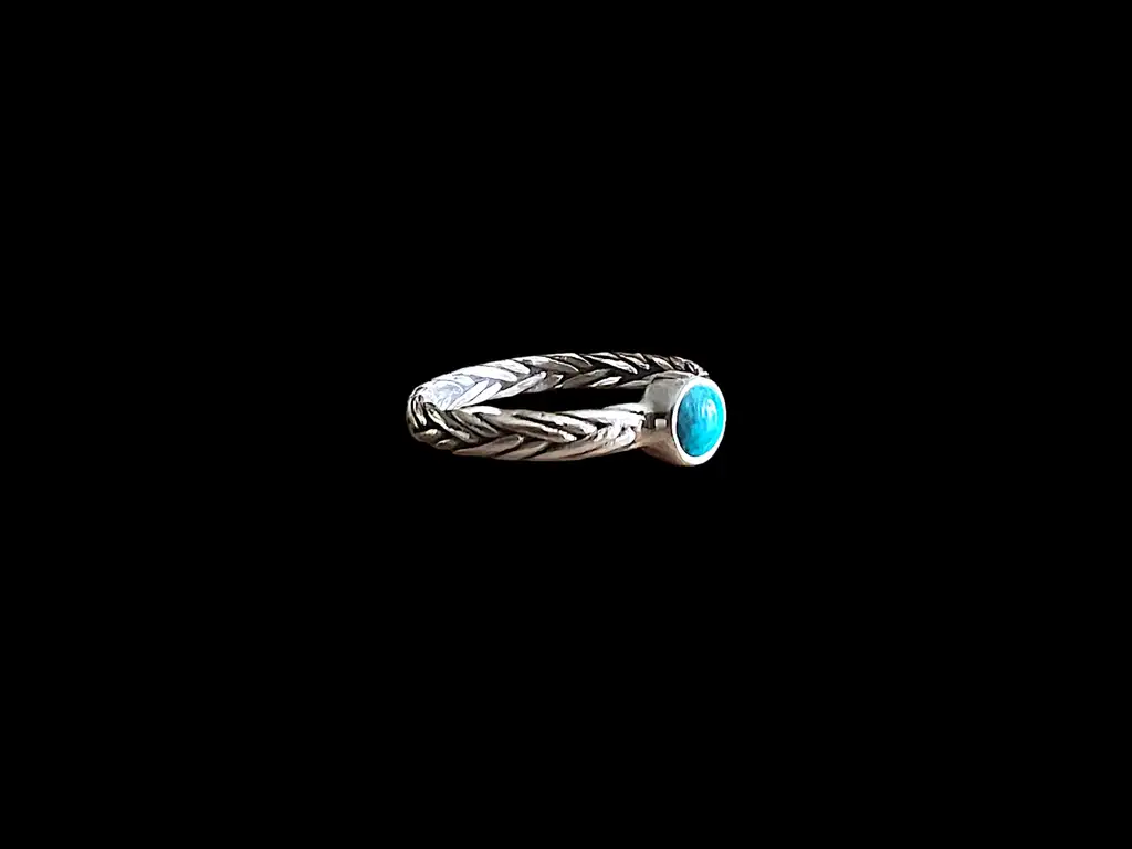 Zilveren dames ring Ciao blue 4 Zilveren schakel ring met turkoois steentje