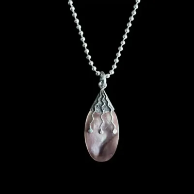 Ovale hanger met zilver en bruine seashell
