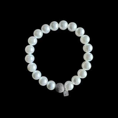 Kralen armband met parels en tibetaans geluksbal